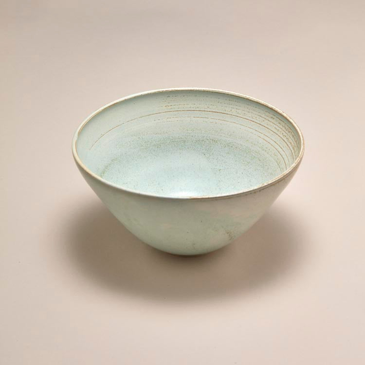 Large green ceramic bowl